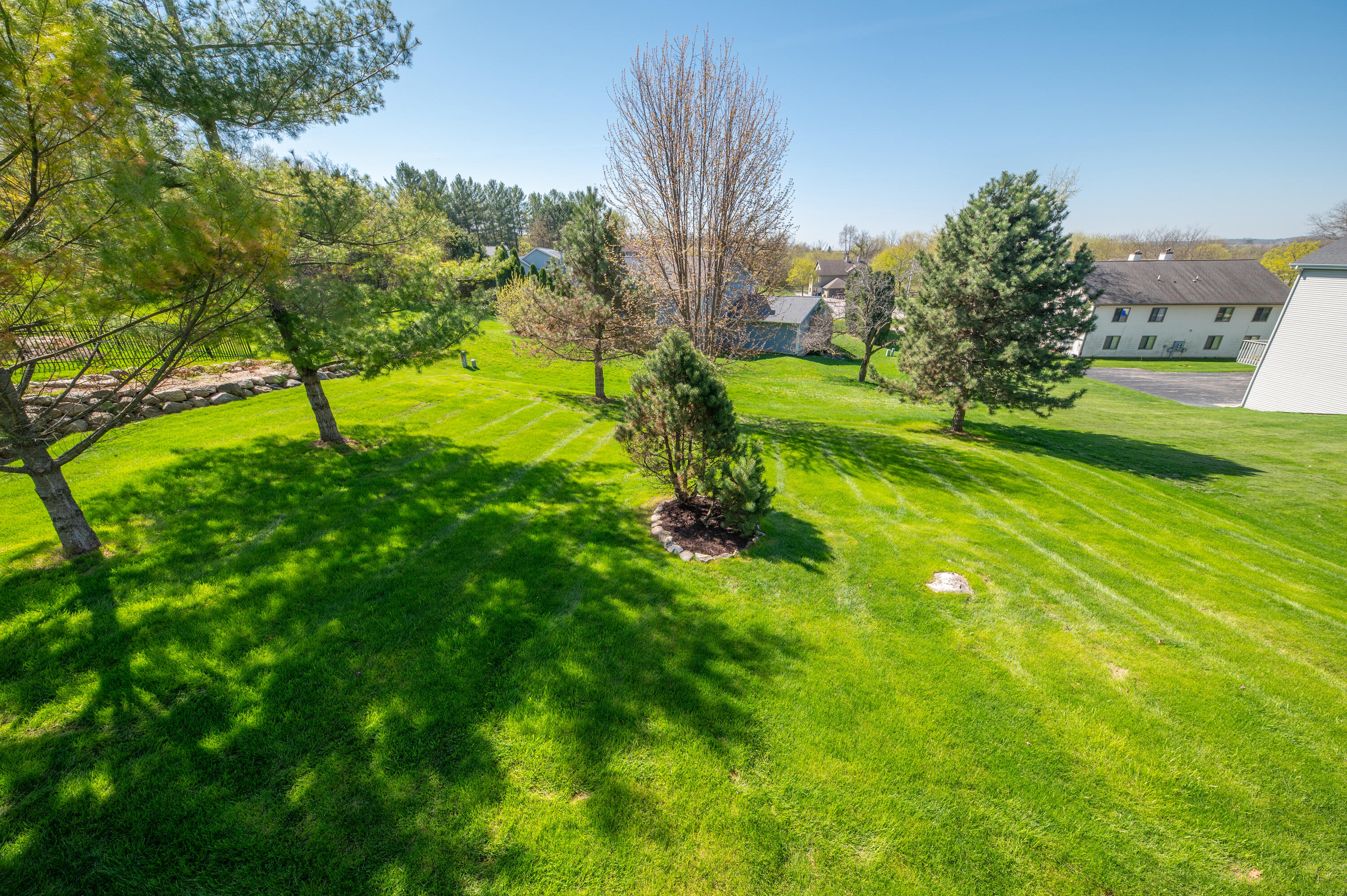 1430 Sunnyridge Road Pewaukee, WI 53072 - Photo 26 of 37 Back yard