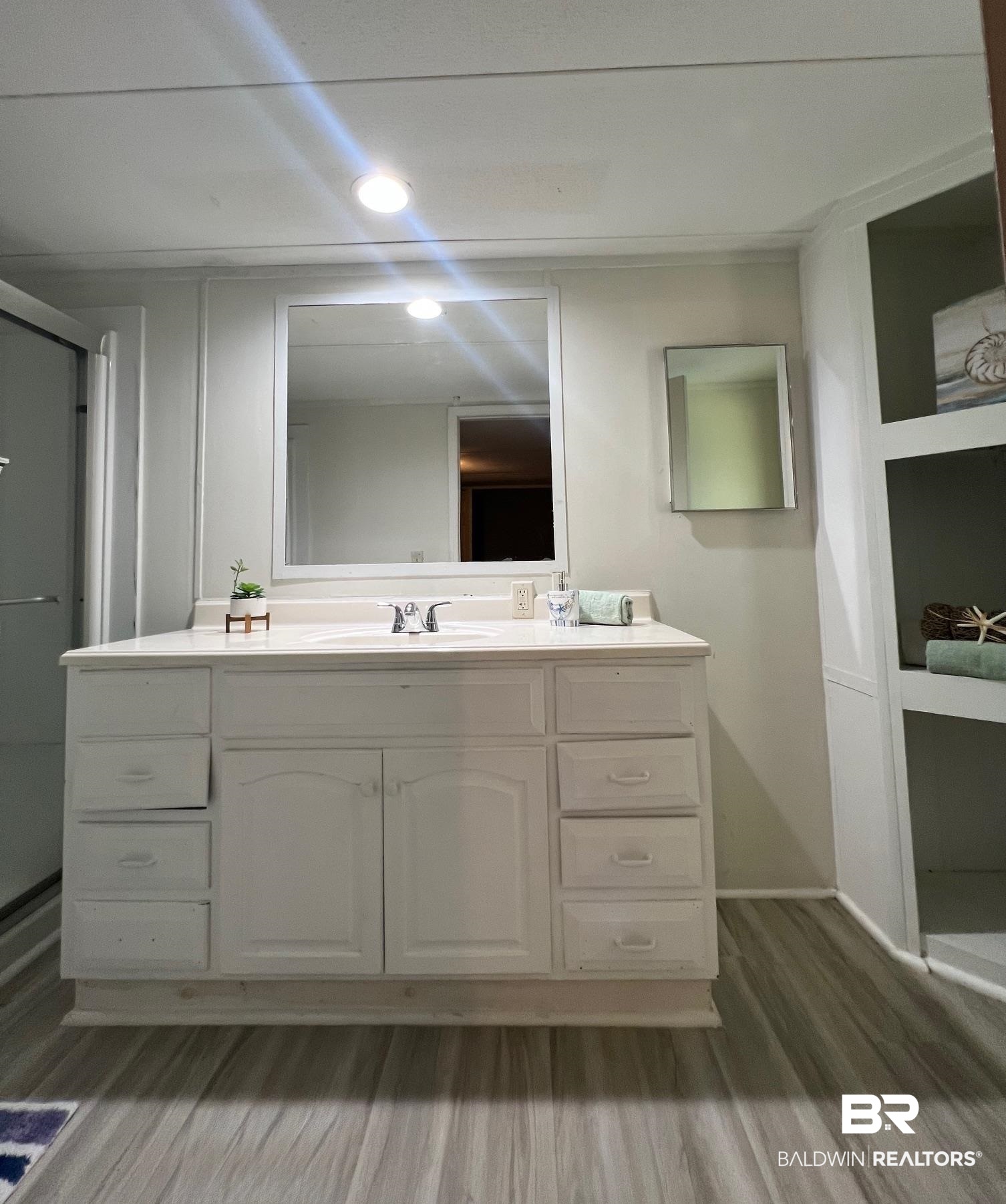 24994 Pompano Drive Elberta, AL 36530 - Photo 7 of 14 Full bathroom featuring vanity, wood finished floors, and recessed lighting