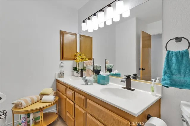 a kitchen with a refrigerator and cabinets