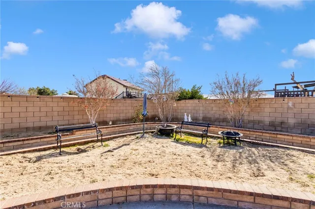 a view of a swimming pool with a lounge chair