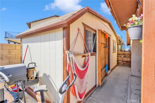 a living room with lots of furniture and a fireplace