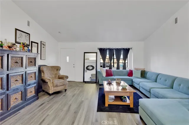 a living room with furniture and a couch