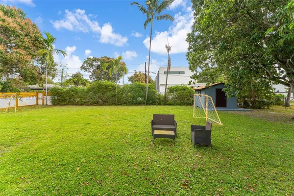 a view of a garden with a bench