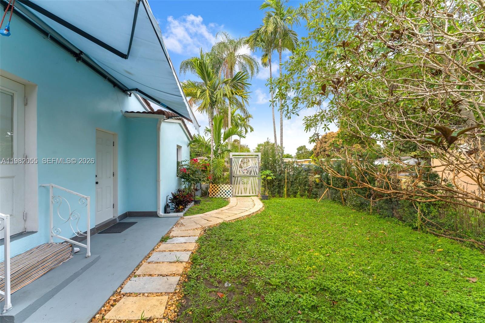 149 Fern Way Miami Springs, FL 33166 - Photo 26 of 35 a view of a backyard of the house