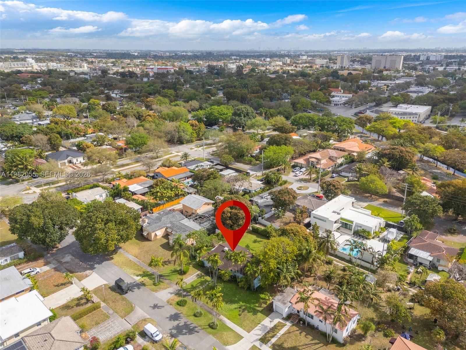 149 Fern Way Miami Springs, FL 33166 - Photo 32 of 35 an aerial view of residential building with parking space