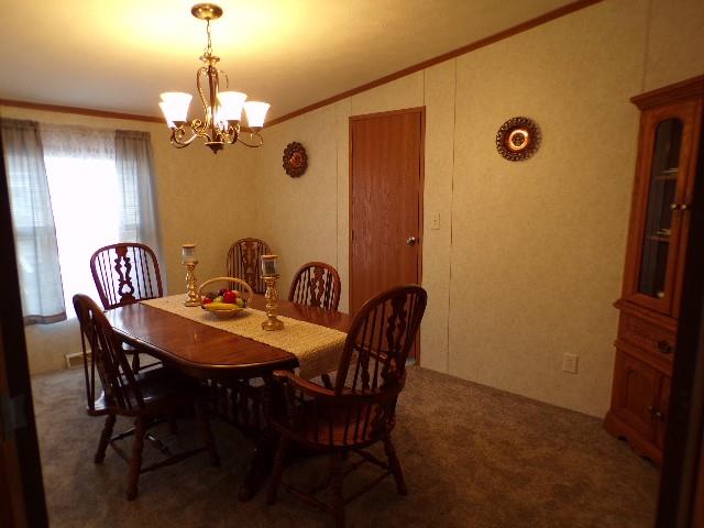629 Deana Way Rochester, PA 15074 - Photo 11 of 23 a view of a dining room with furniture and chandelier