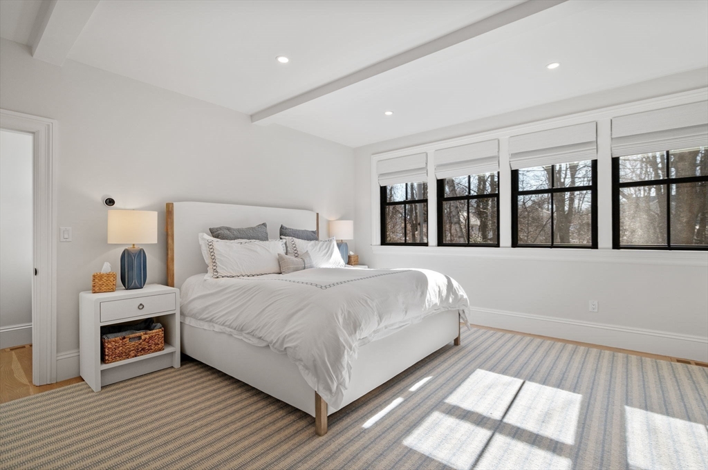 16 Liberty Road Marblehead, MA 01945 - Photo 13 of 29 a bedroom with a large bed and a large window