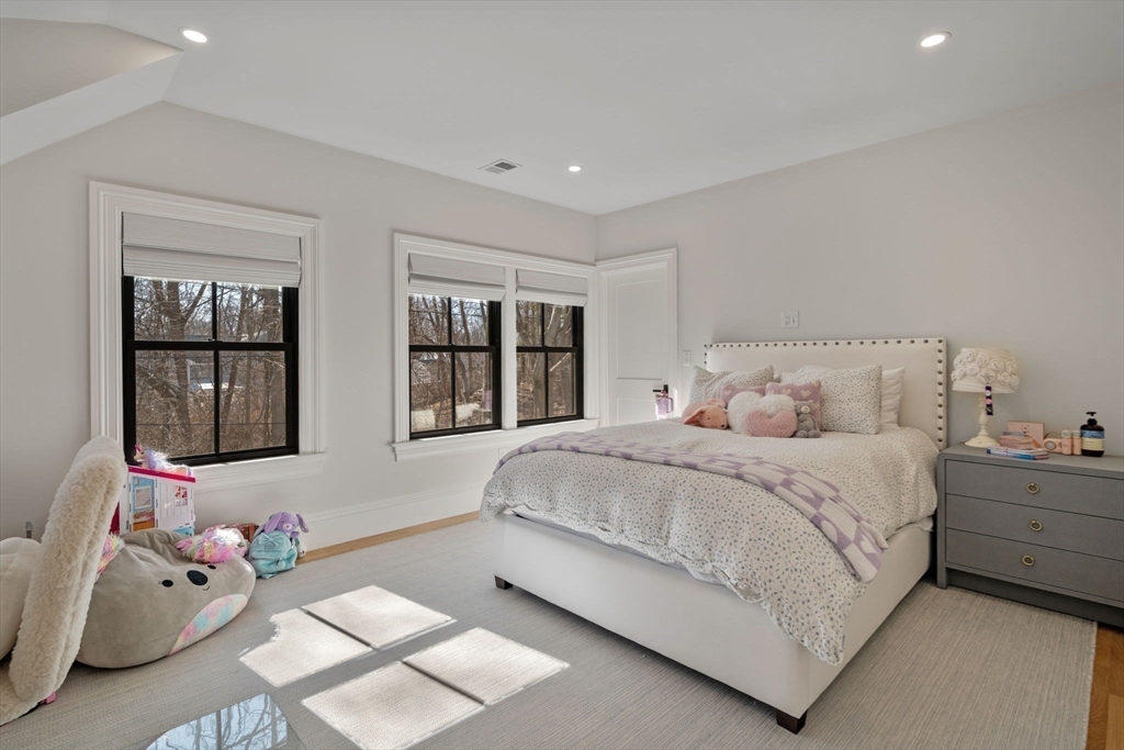 16 Liberty Road Marblehead, MA 01945 - Photo 19 of 29 a bedroom with a bed and window