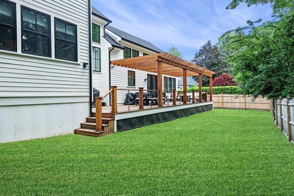 16 Liberty Road Marblehead, MA 01945 - Photo 25 of 29 a view of a house with a backyard