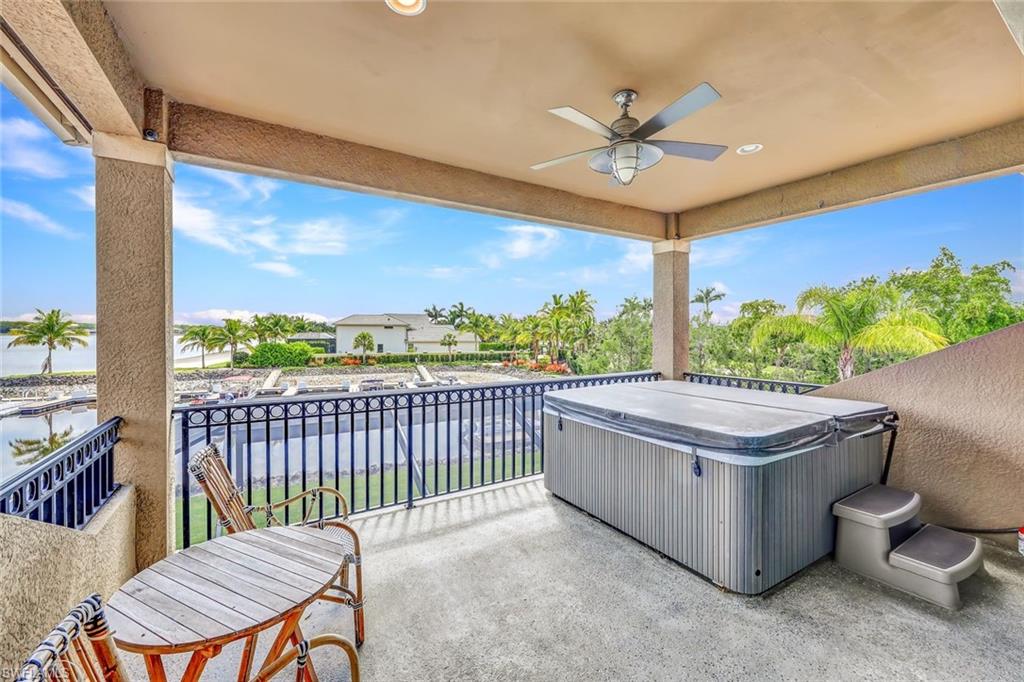 9206 Marble Stone Drive Naples, FL 34120 - Photo 34 of 50 a view of a patio with a table and chairs