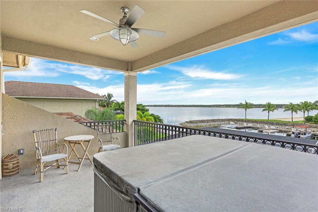 9206 Marble Stone Drive Naples, FL 34120 - Photo 35 of 50 a view of a terrace with a table and chairs