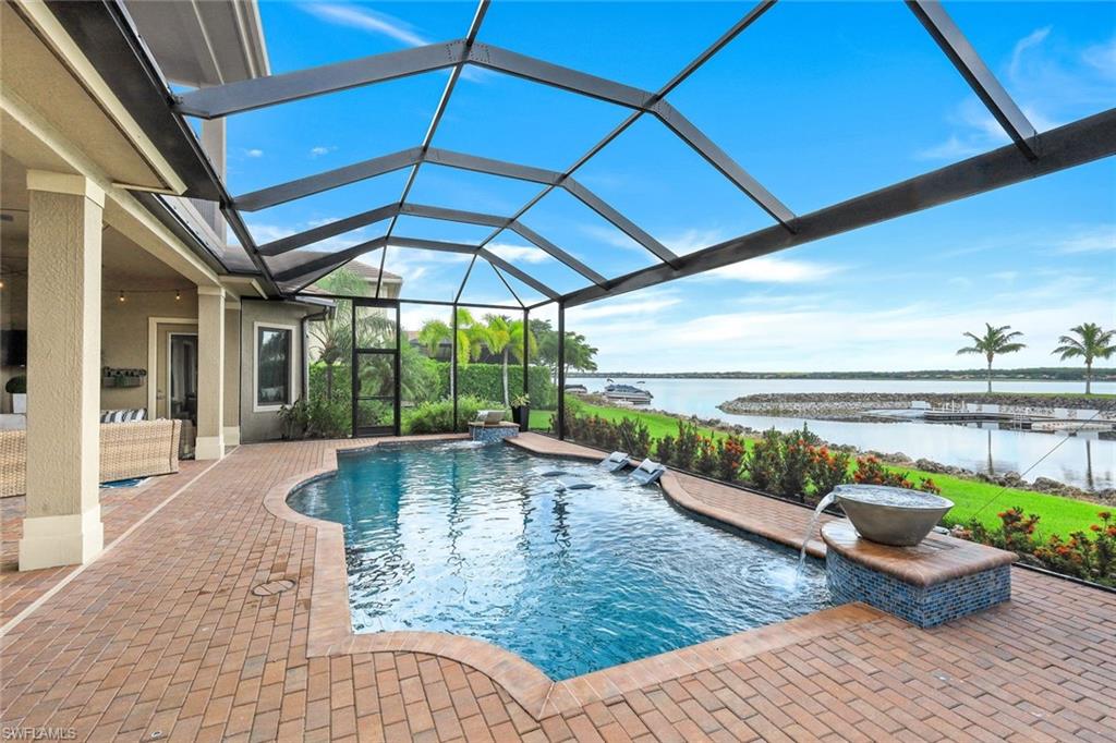 9206 Marble Stone Drive Naples, FL 34120 - Photo 36 of 50 a view of swimming pool with outdoor seating