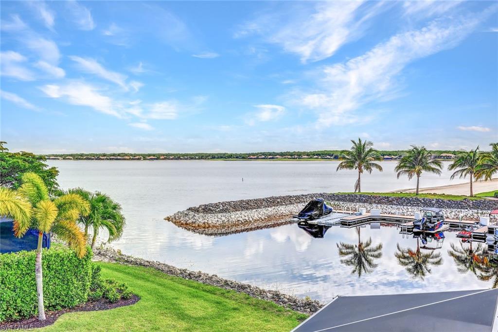 9206 Marble Stone Drive Naples, FL 34120 - Photo 42 of 50 a view of a lake and outdoor space