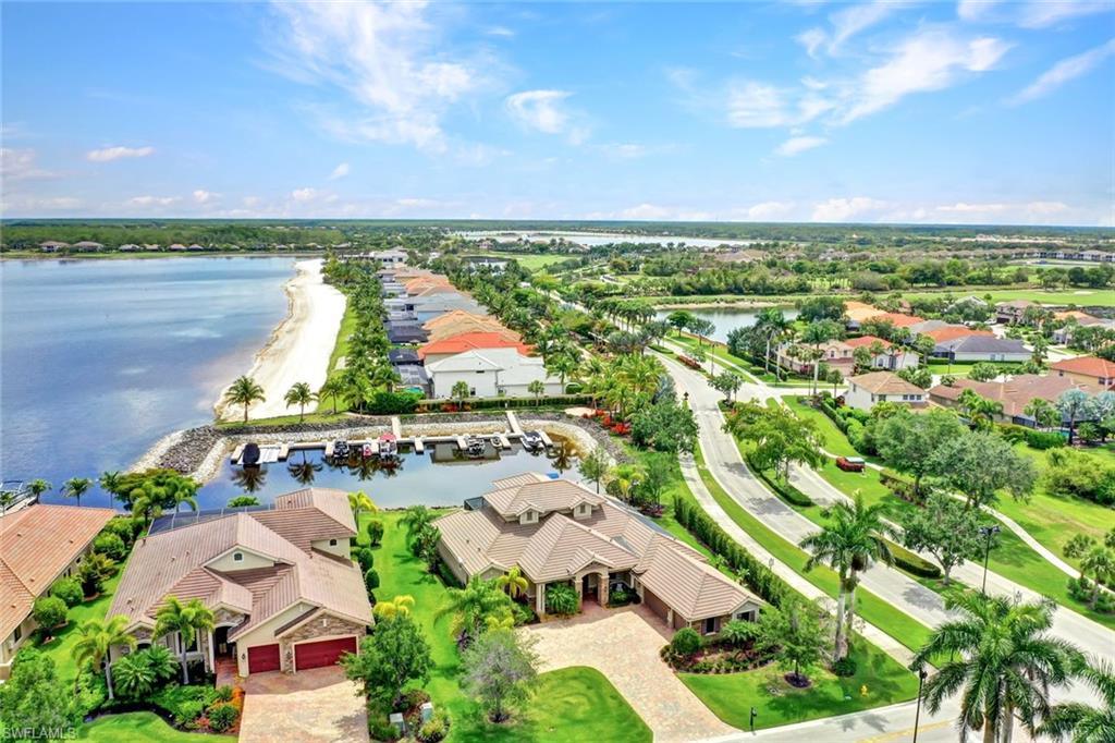 9206 Marble Stone Drive Naples, FL 34120 - Photo 46 of 50 an aerial view of residential houses with outdoor space and ocean view