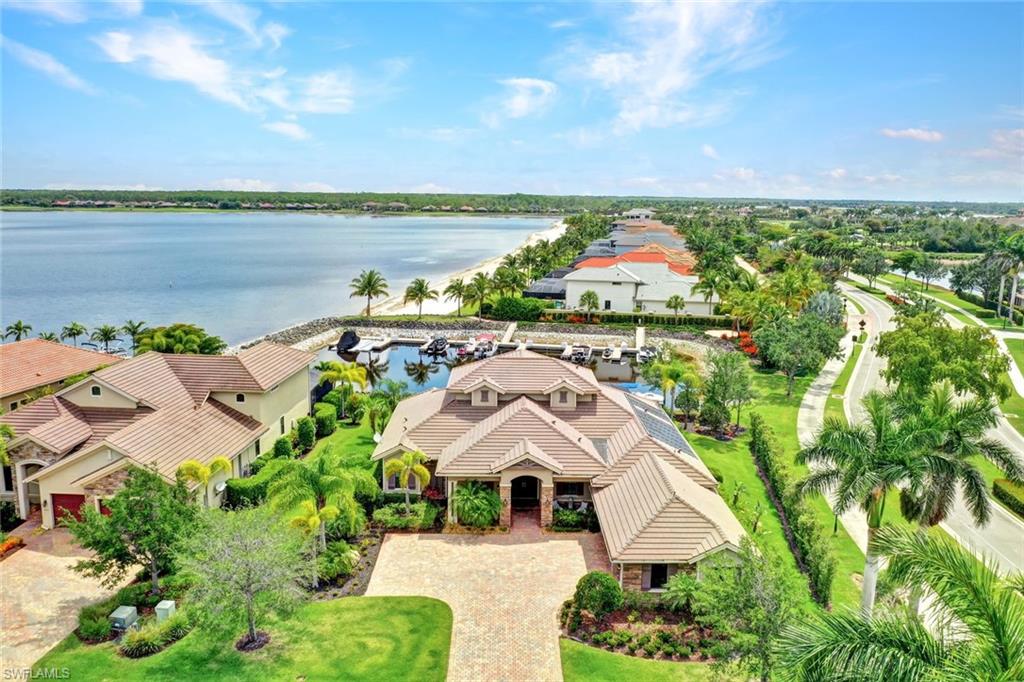 9206 Marble Stone Drive Naples, FL 34120 - Photo 6 of 50 an aerial view of house with yard and ocean view