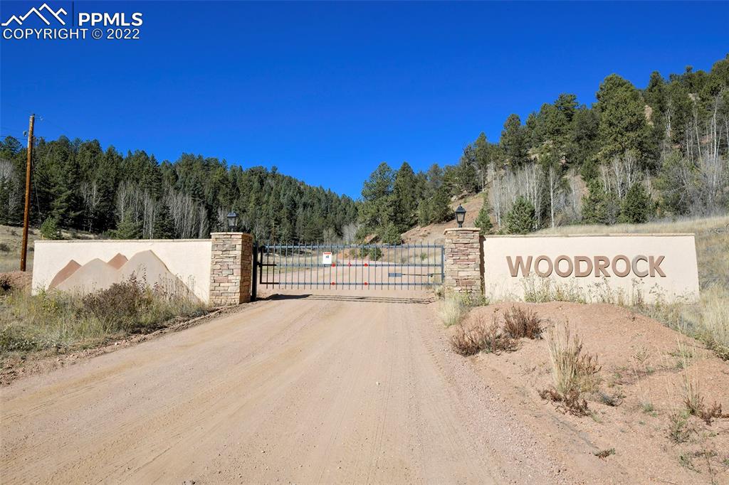 593 Paradiso Road Divide, CO 80814 - Photo 2 of 31 a view of a road with a building in the background