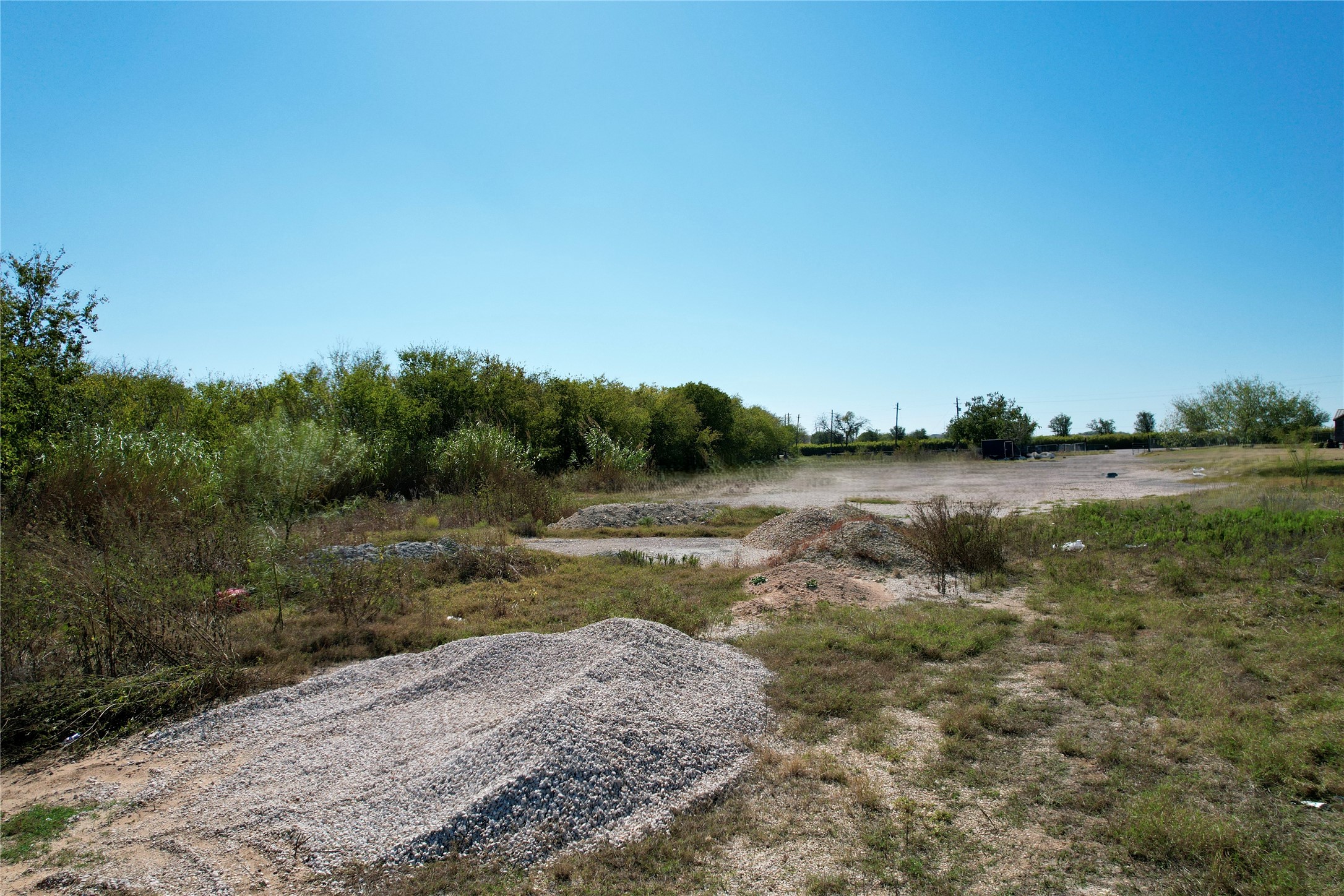10823 Old Lockhart Road Austin, TX 78747 - Photo 16 of 20 a view of a lake with houses in the back