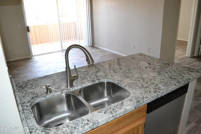 a close view of a sink and a window