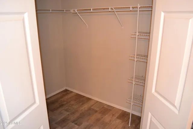 a view of an empty walk in closet