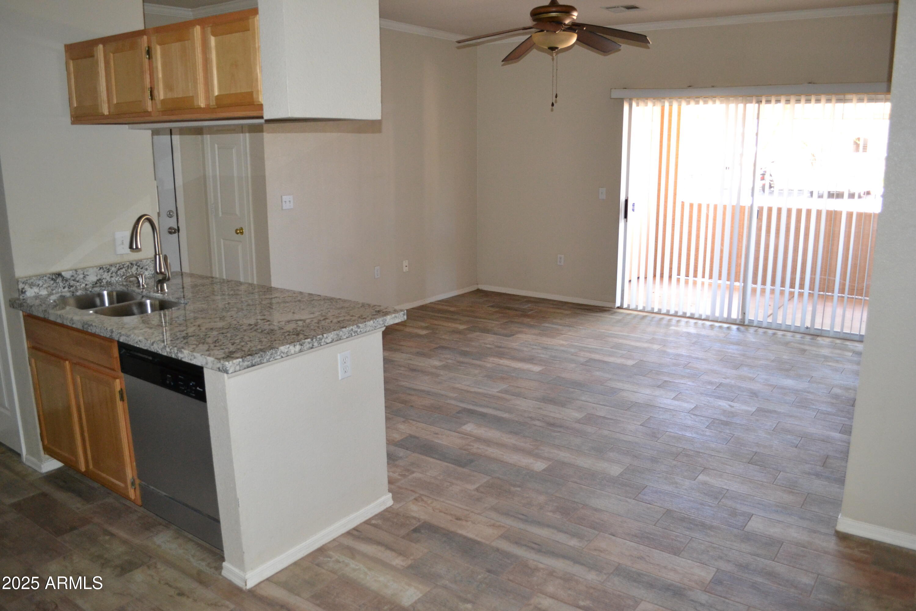 5401 East Van Buren Street, Unit 1011 Phoenix, AZ 85008 - Photo 8 of 17 a view of a kitchen cabinets a sink and dishwasher