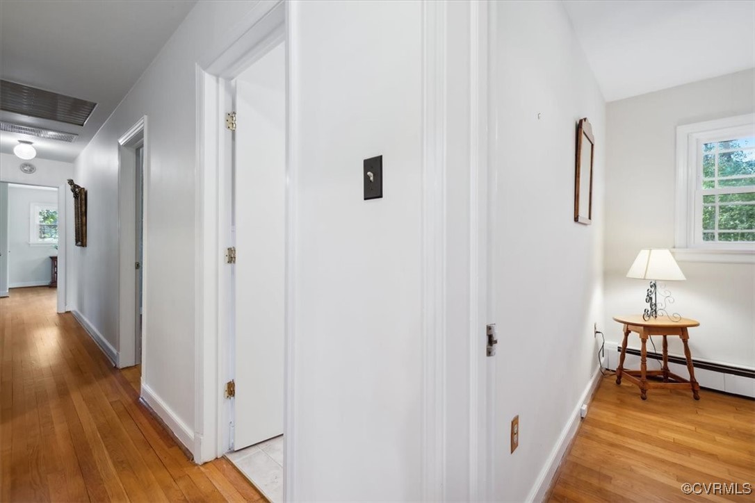 7730 Prairie Road Richmond, VA 23225 - Photo 24 of 50 a view of a room with wooden floor lounge chair and windows