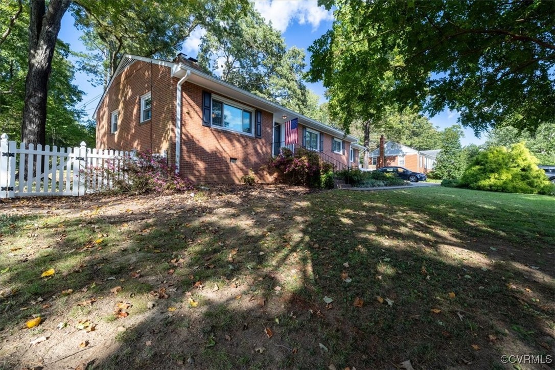 7730 Prairie Road Richmond, VA 23225 - Photo 39 of 50 a view of a house with a yard