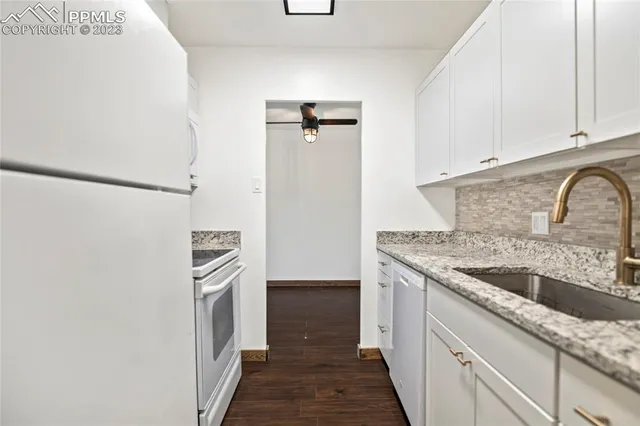 a view of wooden floor and cabinet in a room