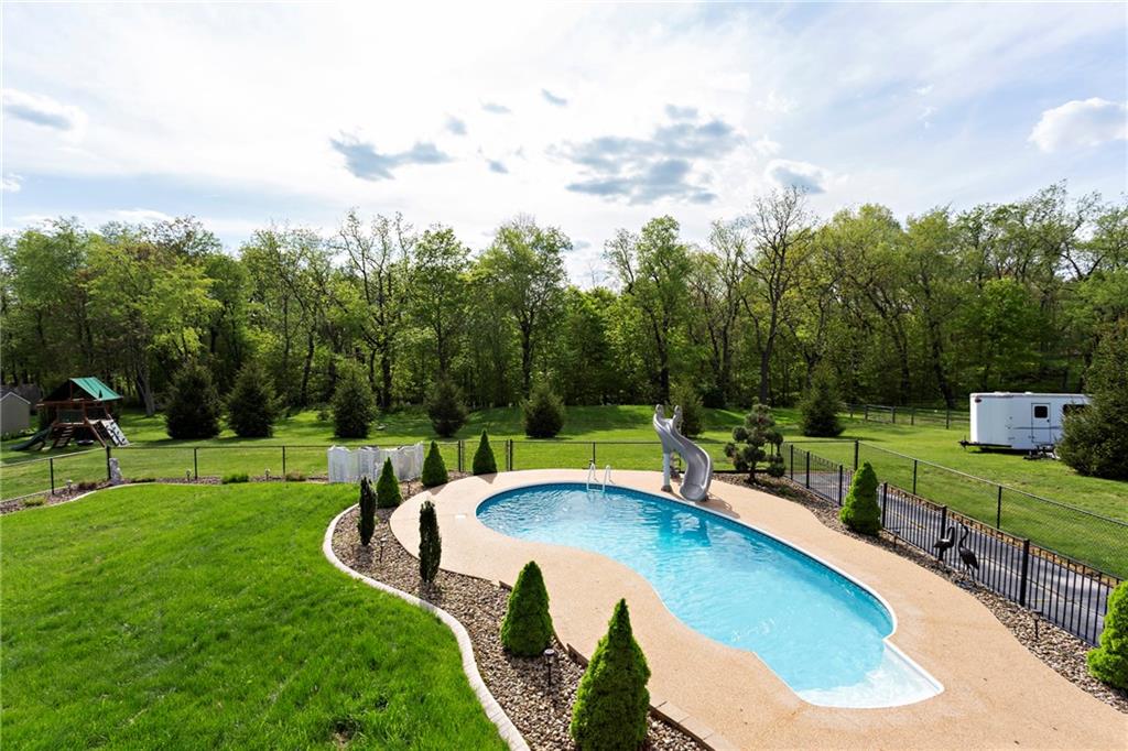 75 Galati Road McDonald, PA 15057 - Photo 6 of 25 Kidney shaped salt-water inground pool with Pebble Stone apron