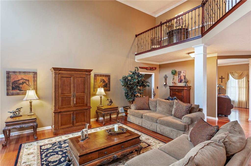 75 Galati Road McDonald, PA 15057 - Photo 10 of 25 Grand 2 story family room. Beautifully finished cherry hardwood floors run the majority of the main level.