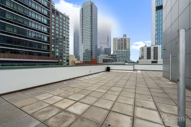 a view of a terrace with city view