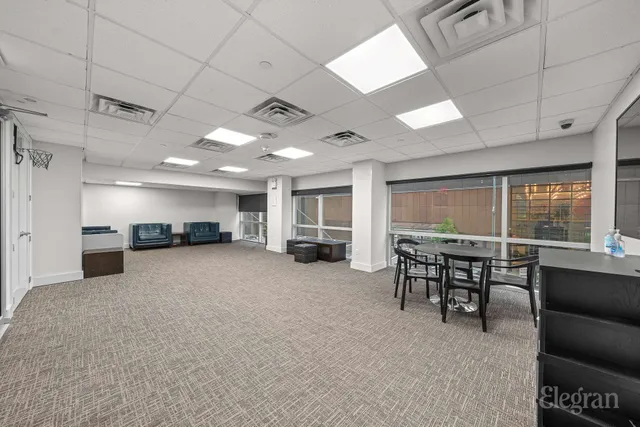 a view of a livingroom with furniture and window