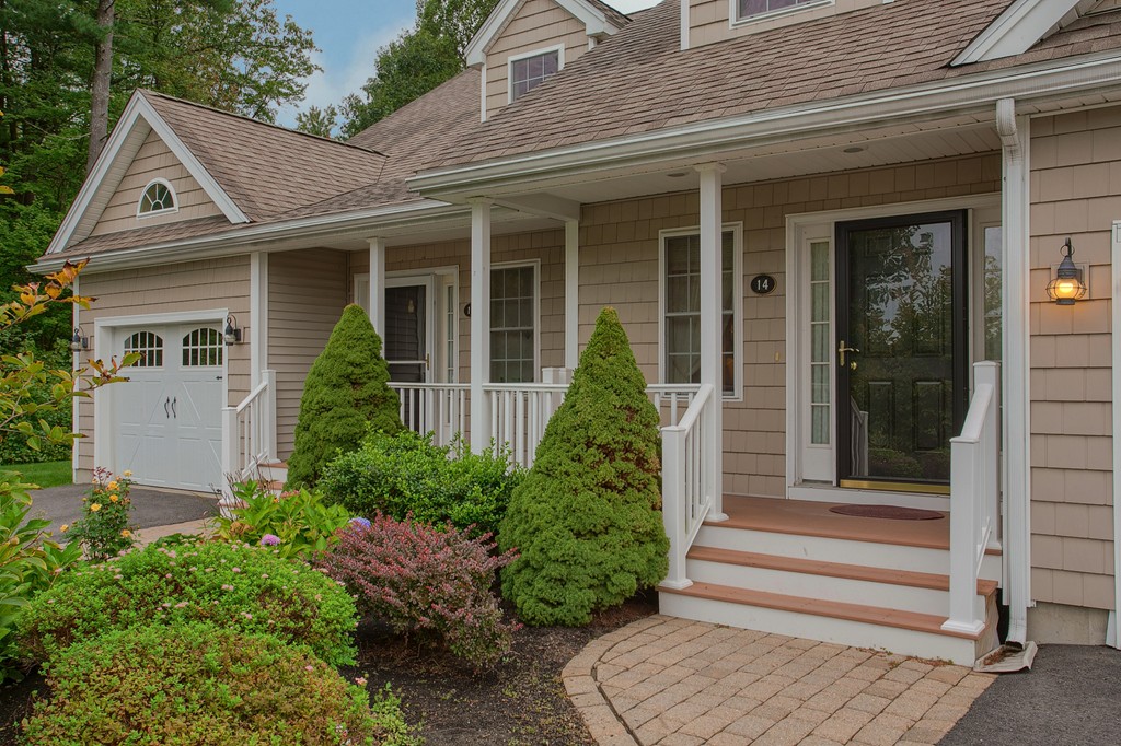 14 Riley Road, Unit 14 Lunenburg, MA 01462 - Photo 29 of 30 a front view of a house with a garden