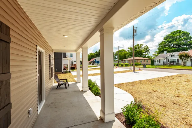 a view of a swimming pool with a patio