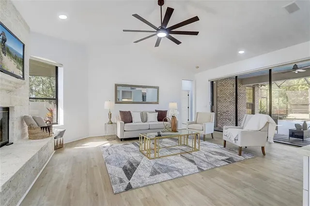 a view of a swimming pool with a yard