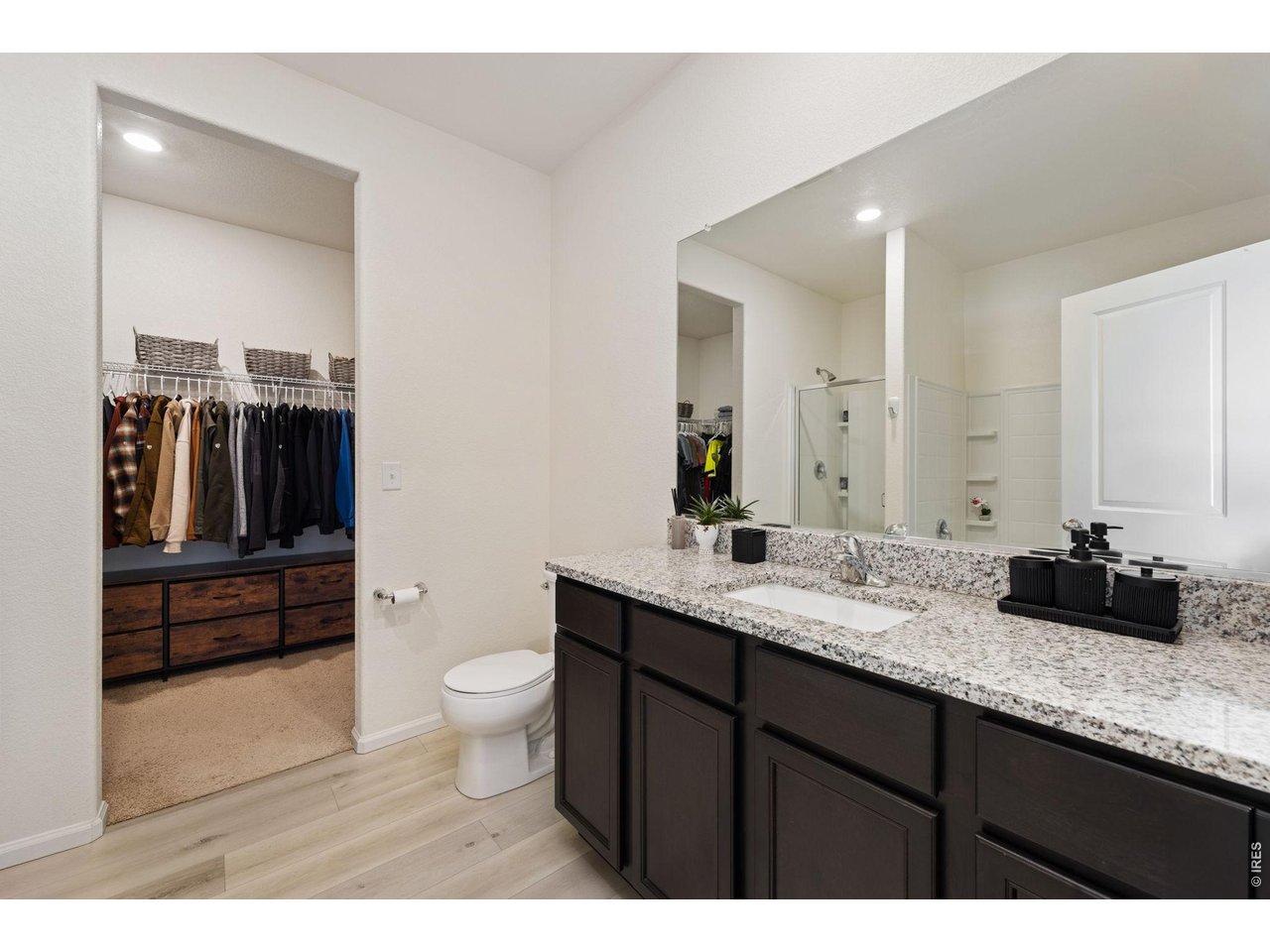 1078 Long Meadows Street Severance, CO 80550 - Photo 21 of 41 Primary Bathroom/ Walk-In Closet
