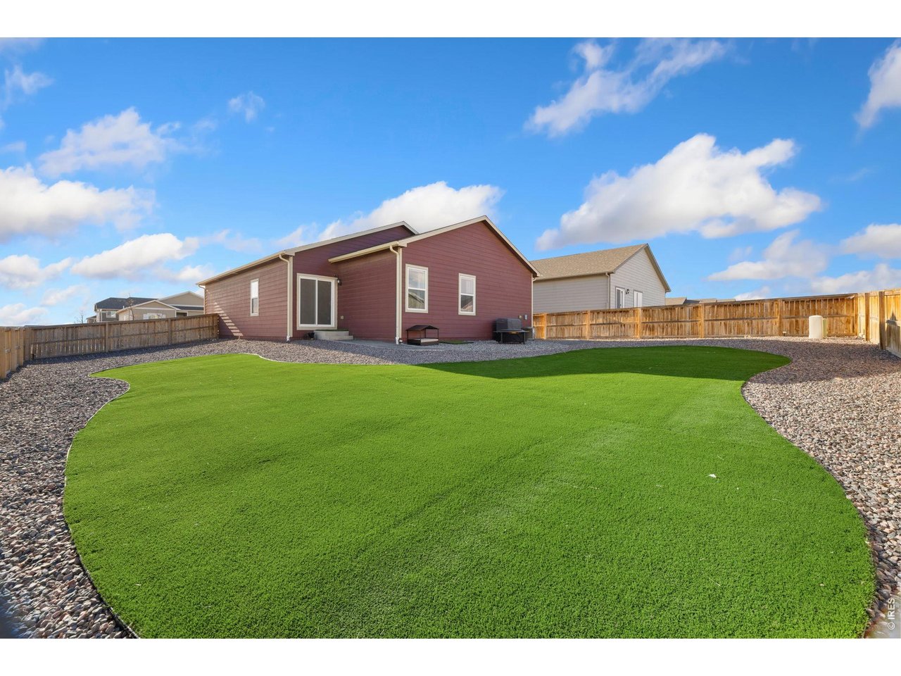 1078 Long Meadows Street Severance, CO 80550 - Photo 31 of 41 Gorgeous artificial turf cuts down on both time and maintenance costs.