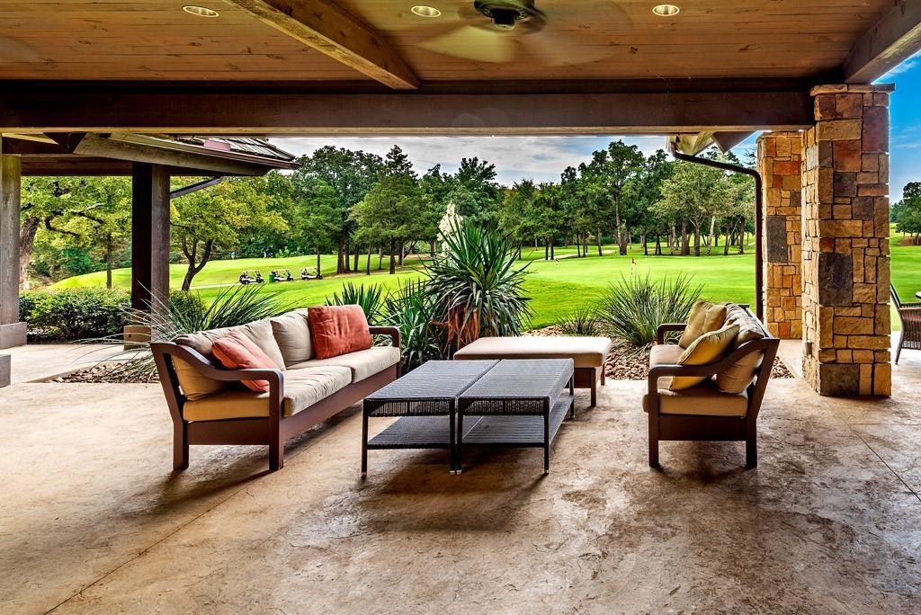 125 Shadow Crk Road Gordonville, TX 76245 - Photo 23 of 35 a view of a patio with couches chairs and a big yard