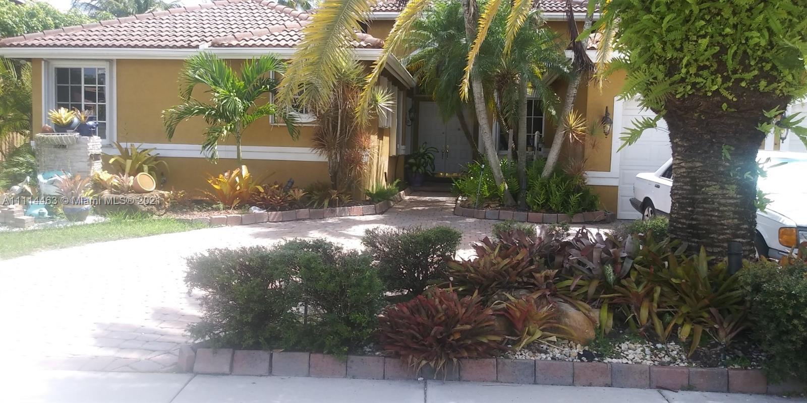 Miramar Miramar, FL 33029 - Photo 8 of 17 a view of a house with a tree in front