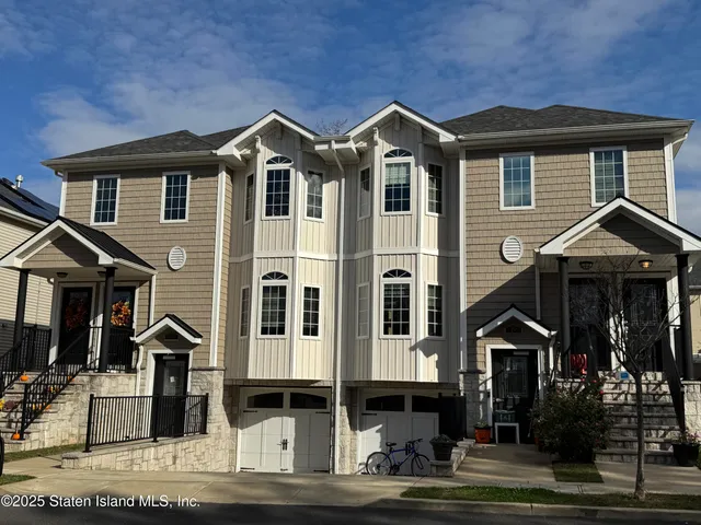 a front view of residential houses
