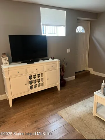 a stove top oven sitting inside of a kitchen