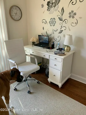 a view of a livingroom with furniture and a fireplace