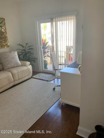 a view of livingroom with furniture and fireplace