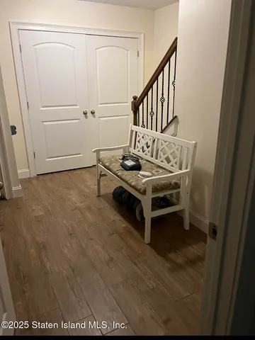 a view of a hallway with staircase