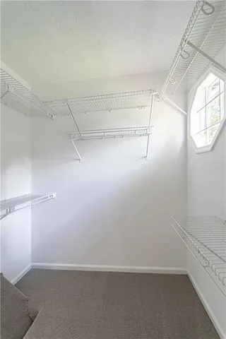 a view of a room with racks on the wall