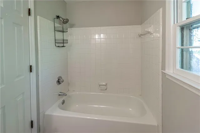 a close view of a bathtub in bathroom