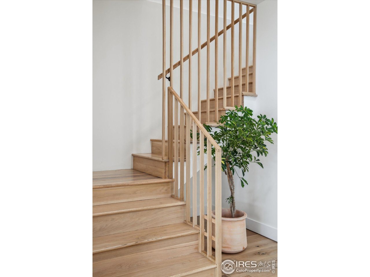 2844 Quitman Street Denver, CO 80212 - Photo 19 of 41 a view of staircase with white walls