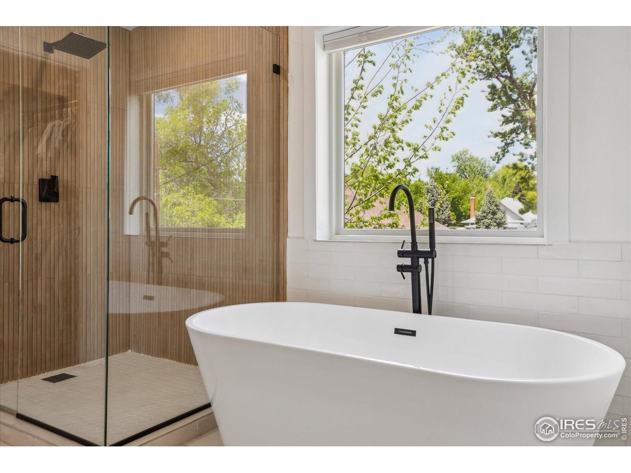 2844 Quitman Street Denver, CO 80212 - Photo 21 of 41 a bathroom with a bathtub and shower