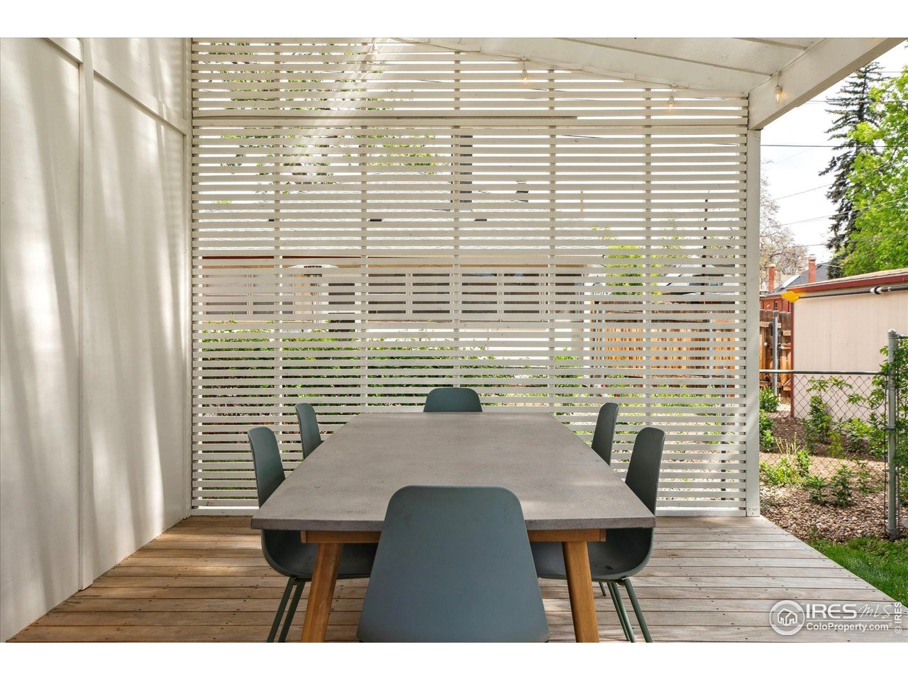 2844 Quitman Street Denver, CO 80212 - Photo 35 of 41 a balcony with table and chairs