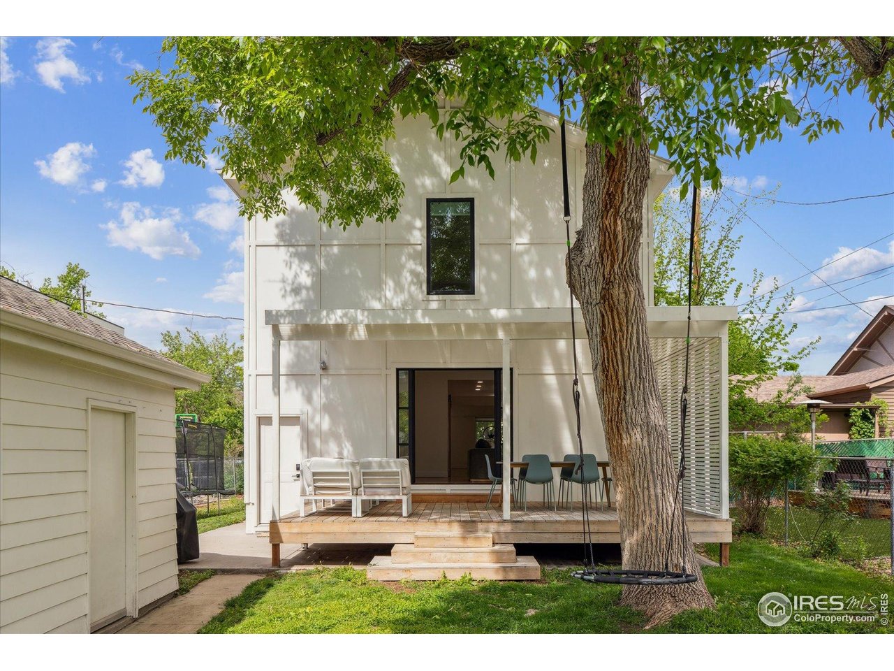 2844 Quitman Street Denver, CO 80212 - Photo 36 of 41 a front view of a house with a yard