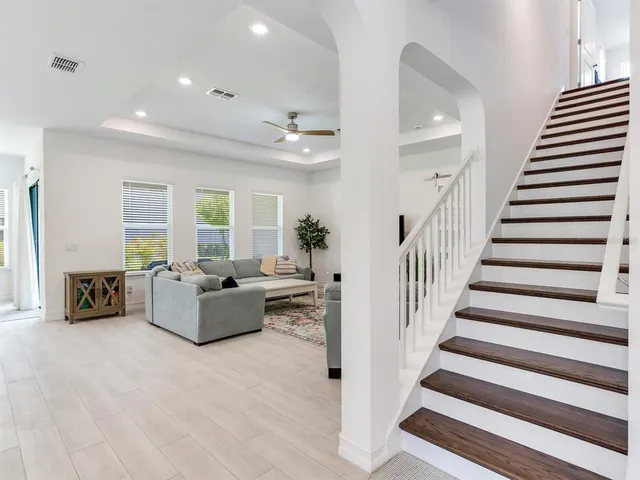a view of kitchen with furniture and wooden floor